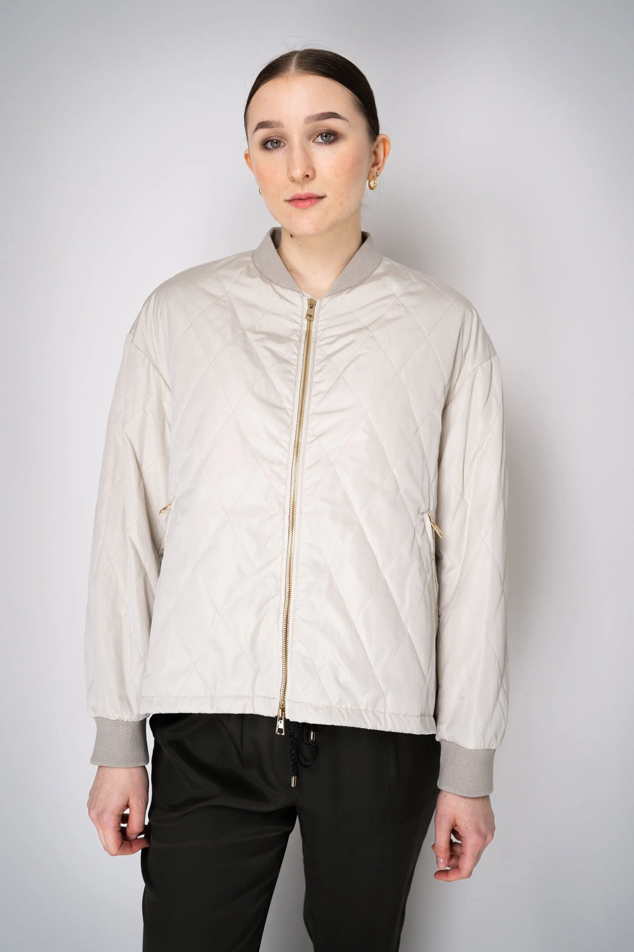 Lorena Antoniazzi Layered Quilted Bomber Jacket in Beige